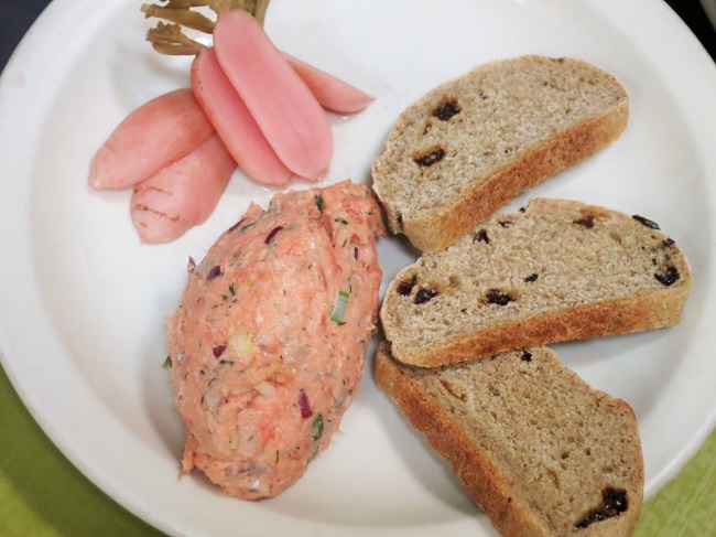 Salmon-smoked salmon rillettes with house-made rye-black currant baguette and fermented radishes