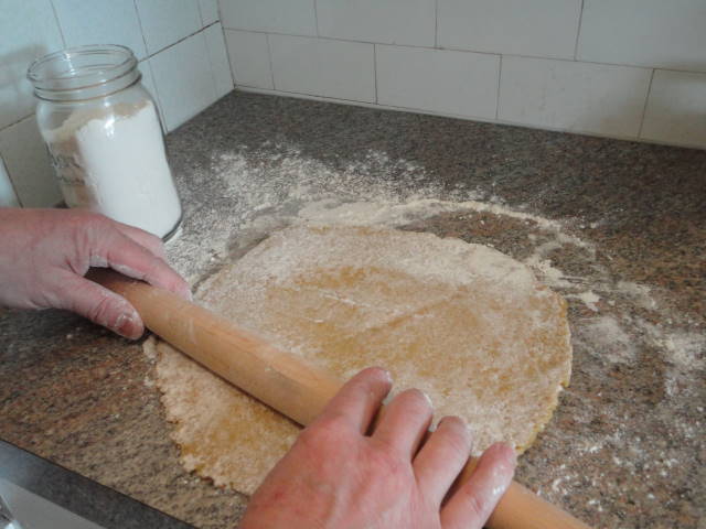 Rolling the dough.