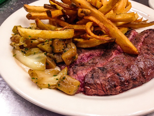 orthwest Grass Fed beef skirt steak, with braised cabbage and apples and roasted chestnut sauce, with pommes frite