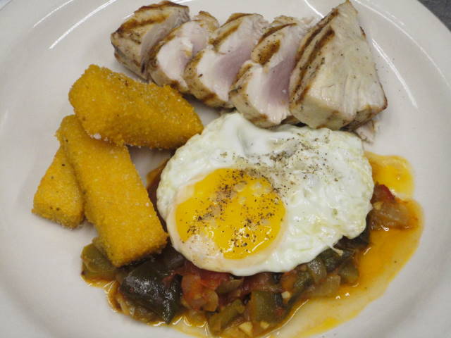 Grilled Washington albacore tuna loin served with piperade, gascon-style corn cakes and a fried farm egg.