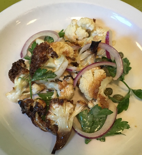 With our cold roasted half chicken, a salad of roasted cauliflower, red onion, capers and anchovy vinaigrette.