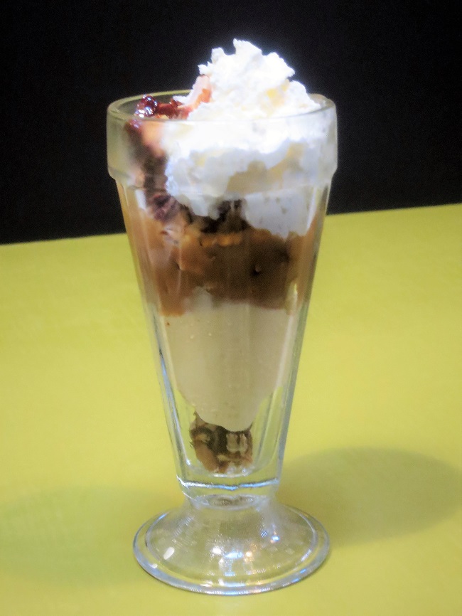 Our Automn coupe glacee features butternut ice cream, candied mixed nuts, butterscotch sauce and whipped cream